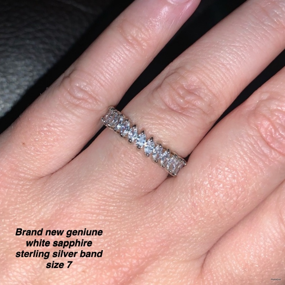 BRAND NEW GENIUNE WHITE SAPPHIRE STERLING SILVER BAND SIZE 7 ONLY